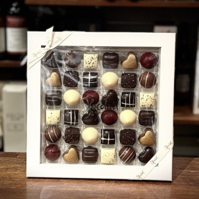 Xocolatl Christiansfelder Star 36 – eksklusiv gaveæske med 36 fyldte chokolader